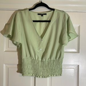 Lipslide top size small v-neck smocked waist